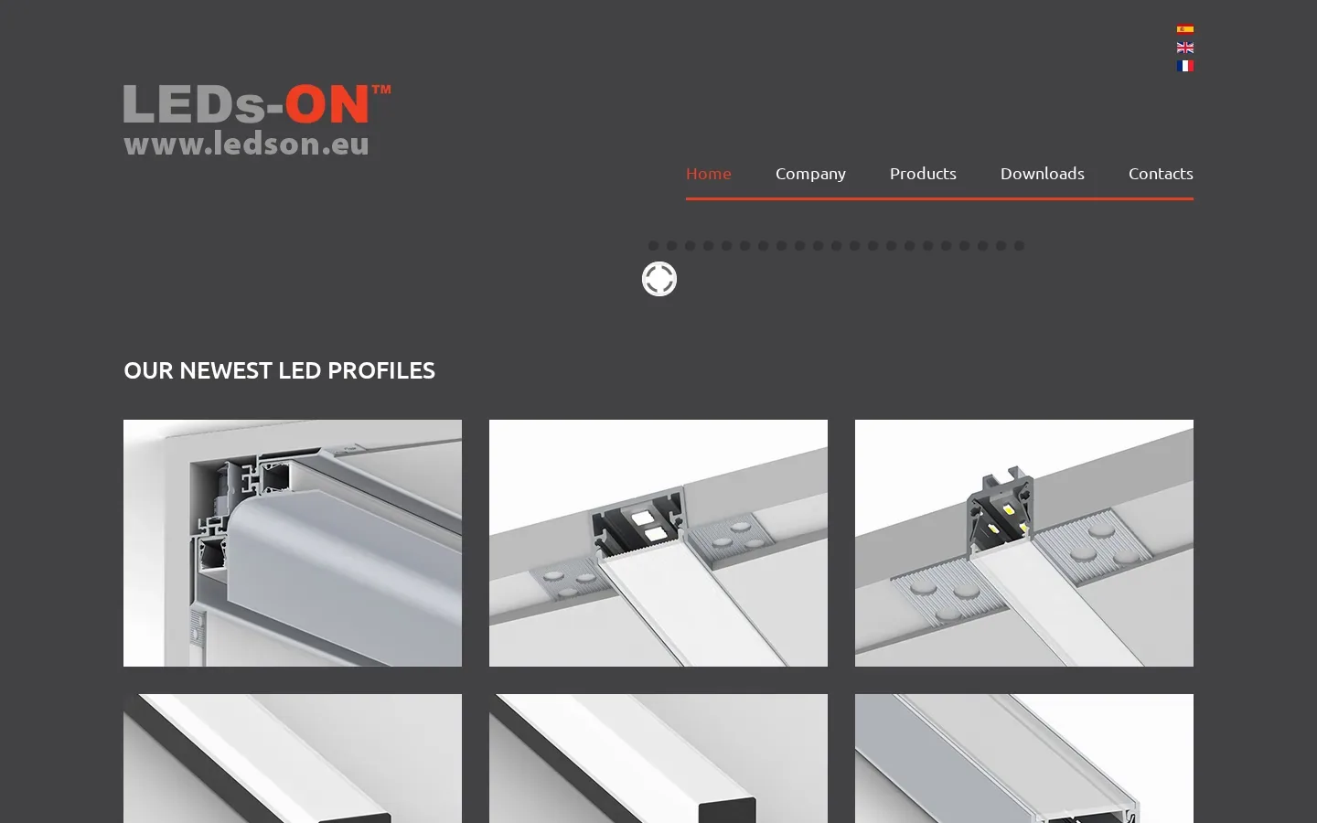 Poprzednia strona LEDsON na Joomla (archive.org): ciemnoszare tło, logo z adresem www.ledson.eu, flagi trzech języków, menu Home, Company, Products, Downloads, Contacts i sekcja „Our newest LED profiles” ze zdjęciami; slajder nie zachował się w archiwum